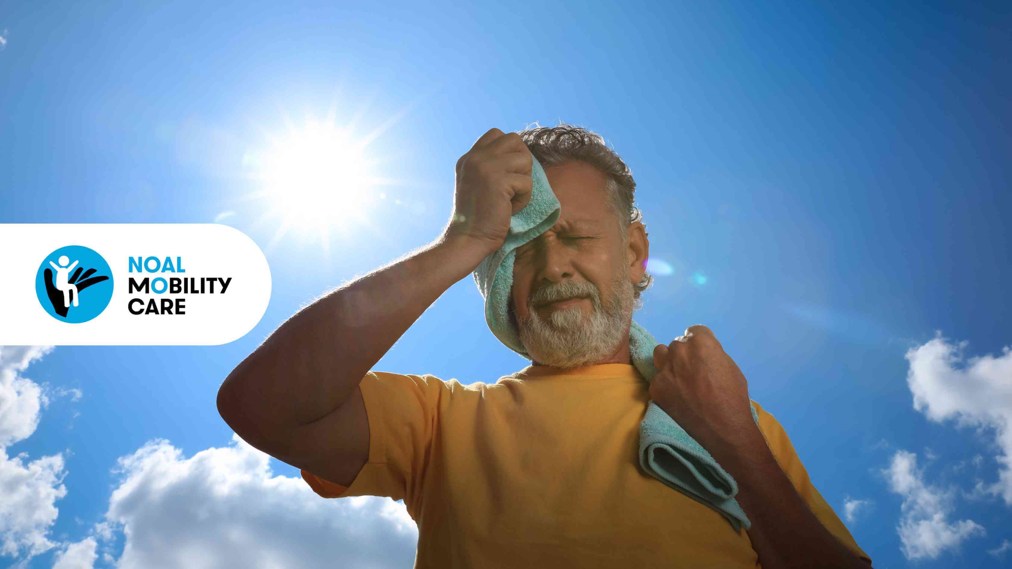 Un anziano accaldato si asciuga la fronte con un asciugamano